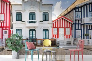 Colorful wooden striped facade in historic neighborhood, Portugal.