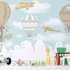 Gliders Hot Air Balloons overlooking city Houses