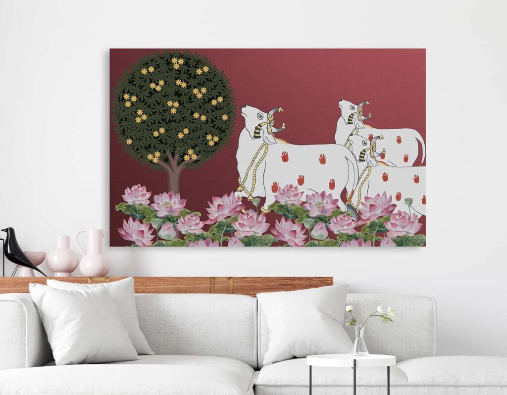 Pichwai art wallpaper featuring sacred cows with a flowering tree and lotus pond, symbolising devotion and harmony in traditional Indian décor